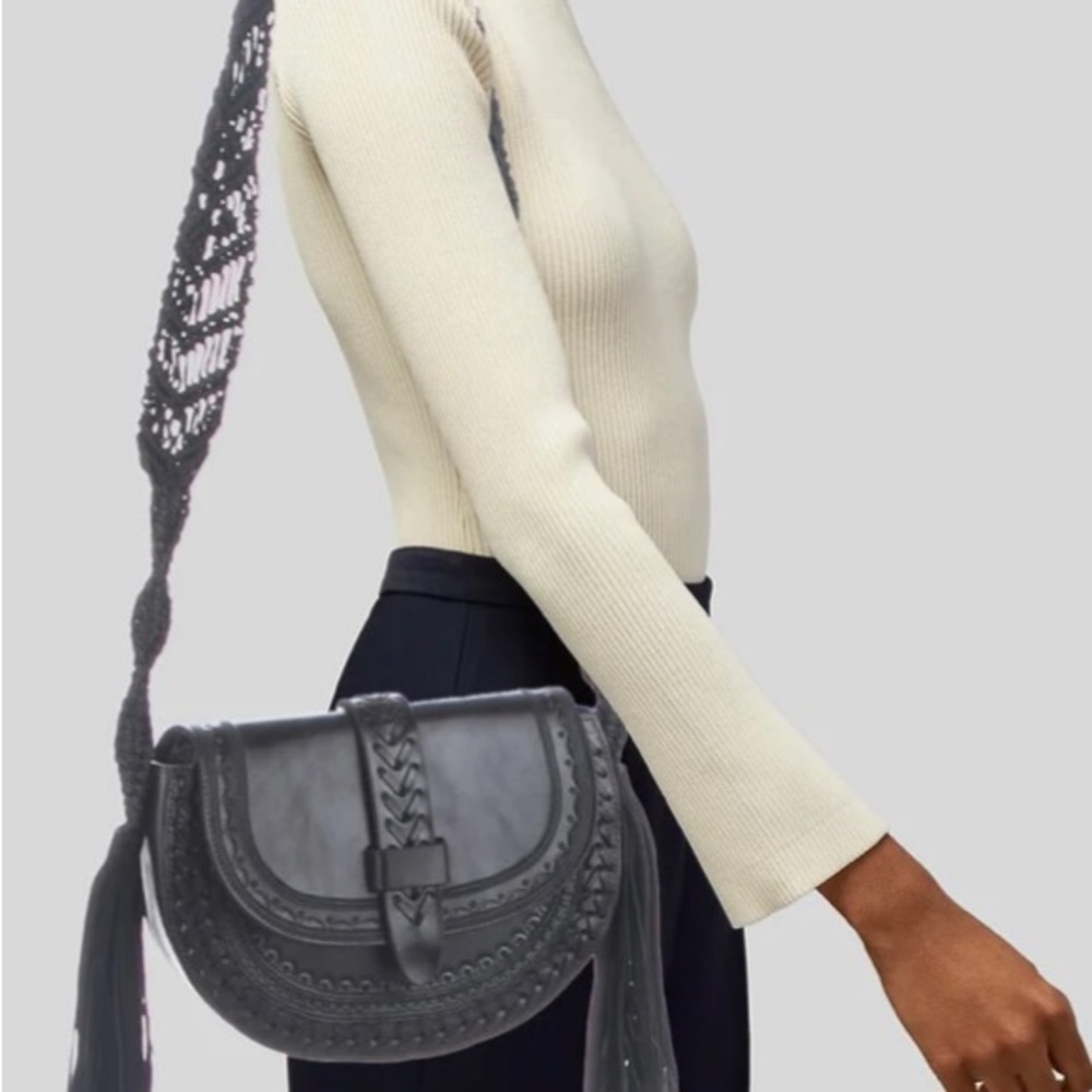 Hard to find- the Black  or Brown Rhita fringe bag ULLA JOHNSON sold separately
